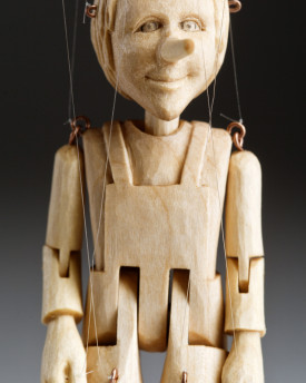 The smallest Pinocchio marionette in the world - precisely hand-carved from a linden wood
